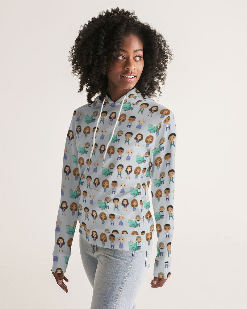 looking off to the side dark skinned woman with natural curly hair modeling grey sweatshirt with illustrated character repeating print