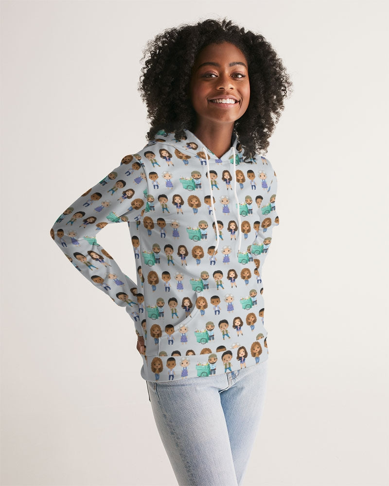 smiling with hands in her back jeans pockets dark skinned woman with natural curly hair modeling grey sweatshirt with illustrated character repeating print 